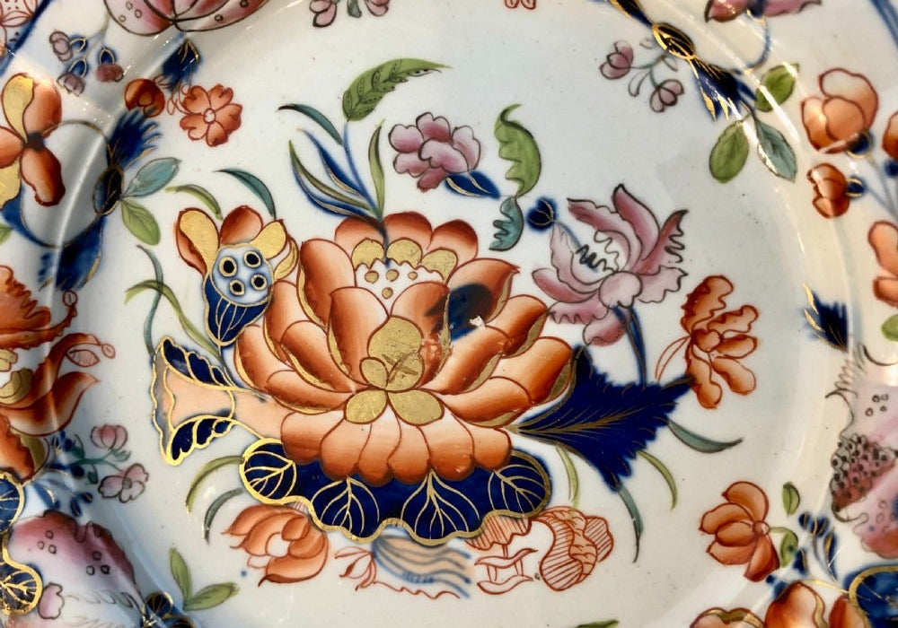 Antique Mason’s Ironstone plate with Imari-style florals in orange, cobalt, and gilt — an example of early 19th-century English interpretation of Asian porcelain.